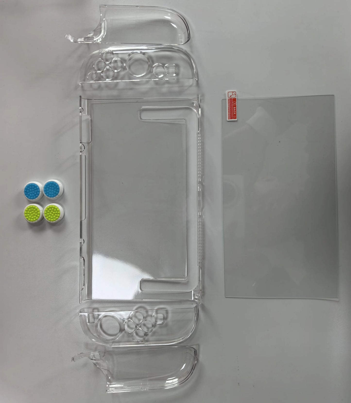 غطاء حماية كريستالي صلب 8 في 1 من KJH، غطاء مقبض إبهام عصا التحكم، واقي شاشة من الزجاج المقوى لجهاز Nintendo Switch