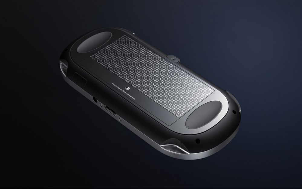 وحدة تحكم سوني بلاي ستيشن فيتا OLED من سلسلة 1000 - لون أسود بيانو كامل في العلبة