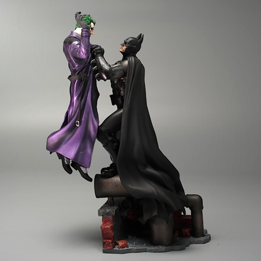 Batman holding the Joker Batman: Arkham Origins Collector’s Edition
