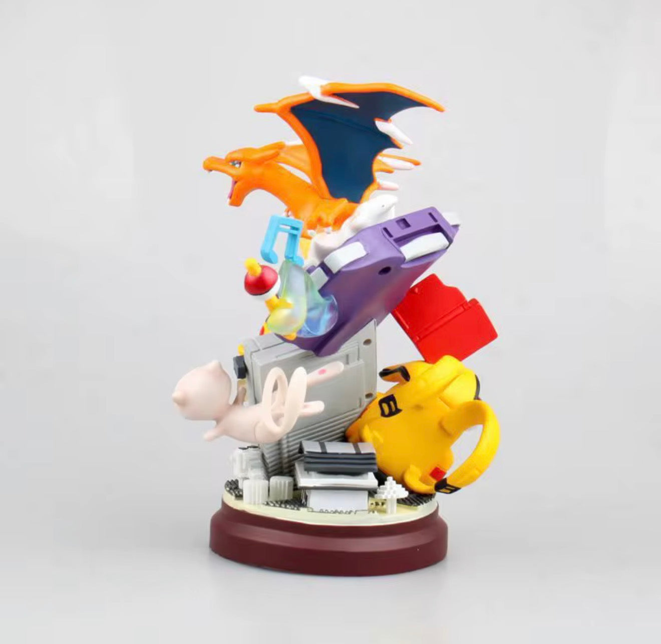 Pokémon Diorama 20CM featuring Pikachu, Charizard, and Mew Interacting with Classic Nintendo Game Boy Consoles.