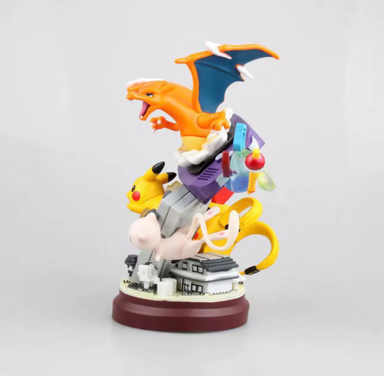 Pokémon Diorama 20CM featuring Pikachu, Charizard, and Mew Interacting with Classic Nintendo Game Boy Consoles.